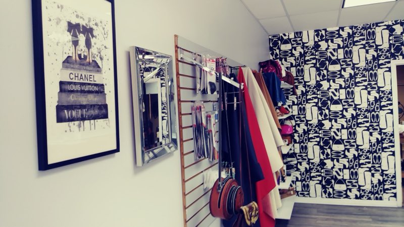 Upscale interior with designer decor and handbag display