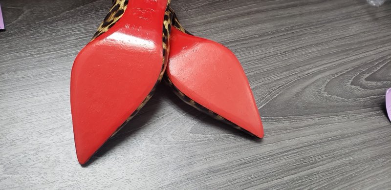 Leopard-print heels with freshly refinished red soles